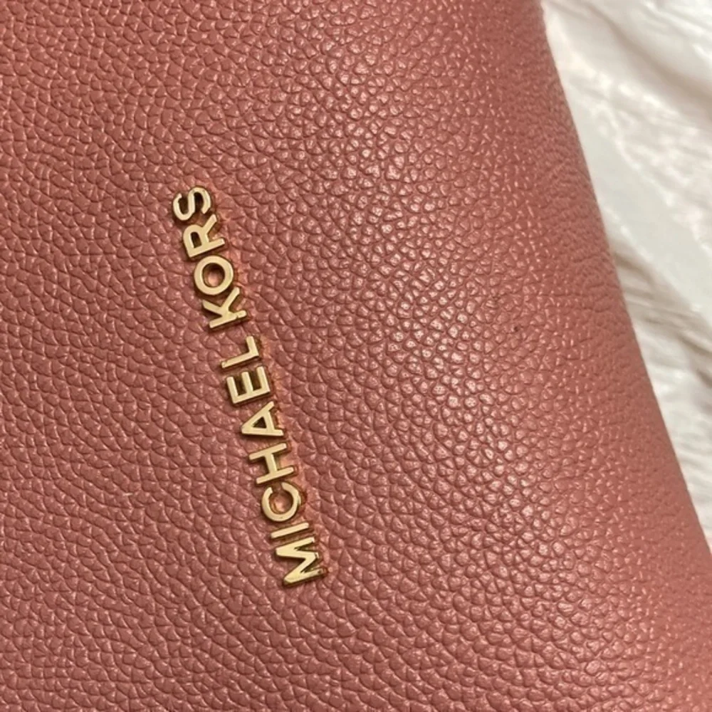 Michael kors pink pebbled leather Nicole bag